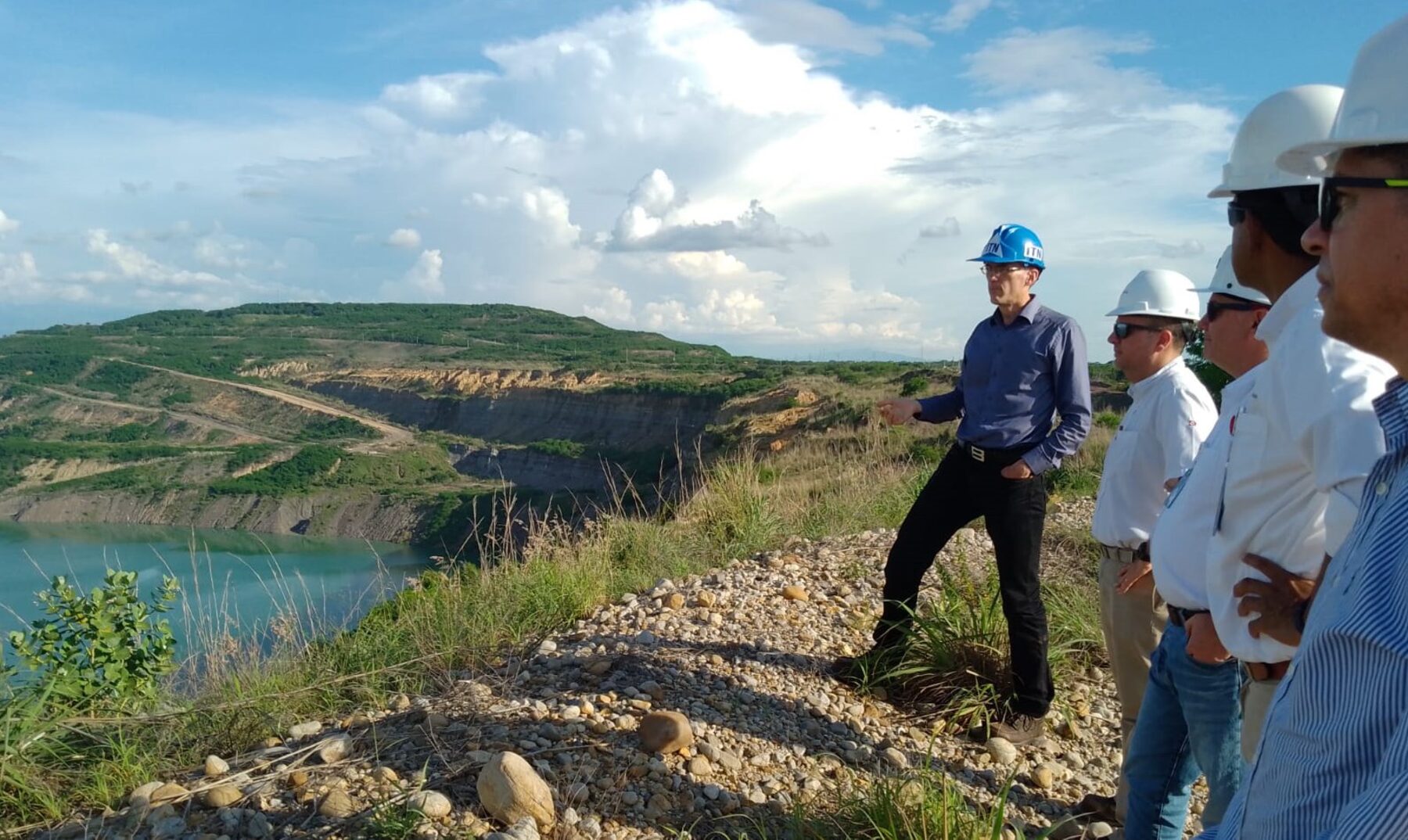 Engineers evaluating a flooded open-pit mine site in Cesar, Colombia